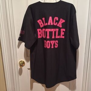 Black bottle boys. Rare. Back and pink jersey